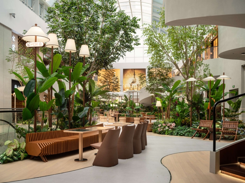 Step Inside This Indoor Garden Dining Plaza Filled With Plants And Pathways