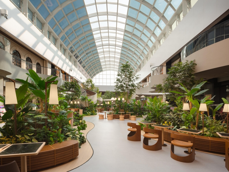 Step Inside This Indoor Garden Dining Plaza Filled With Plants And Pathways