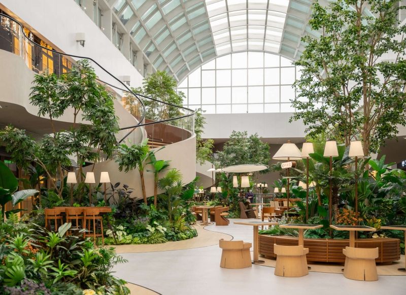 Step Inside This Indoor Garden Dining Plaza Filled With Plants And Pathways