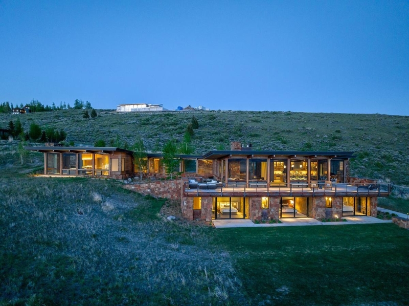 This Grass-Roofed Home With Stone Walls Feels Like It Grew From the Mountain