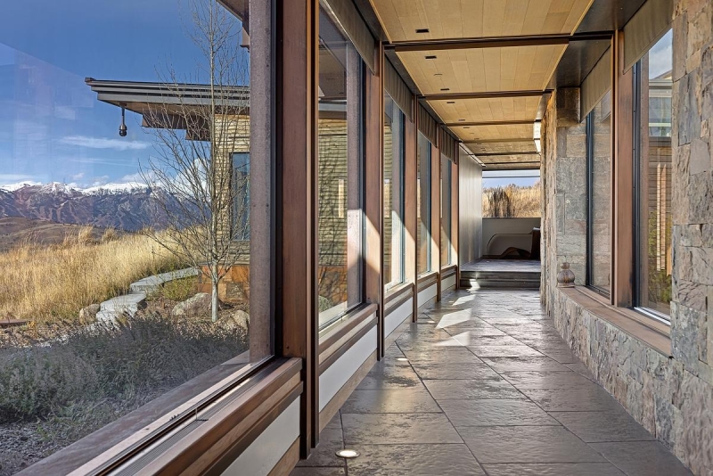 This Grass-Roofed Home With Stone Walls Feels Like It Grew From the Mountain