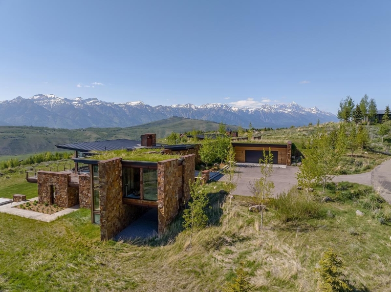 This Grass-Roofed Home With Stone Walls Feels Like It Grew From the Mountain