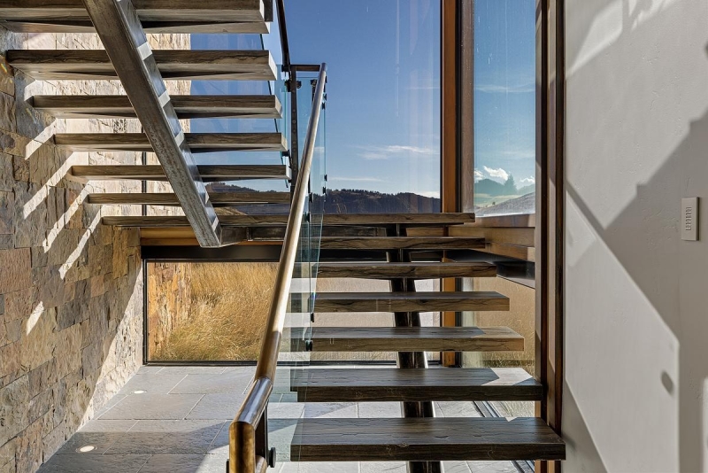 This Grass-Roofed Home With Stone Walls Feels Like It Grew From the Mountain