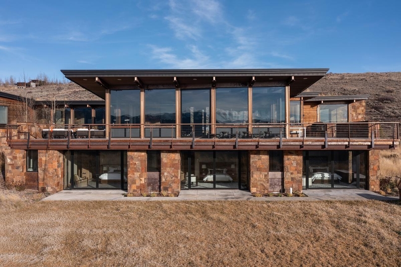 This Grass-Roofed Home With Stone Walls Feels Like It Grew From the Mountain