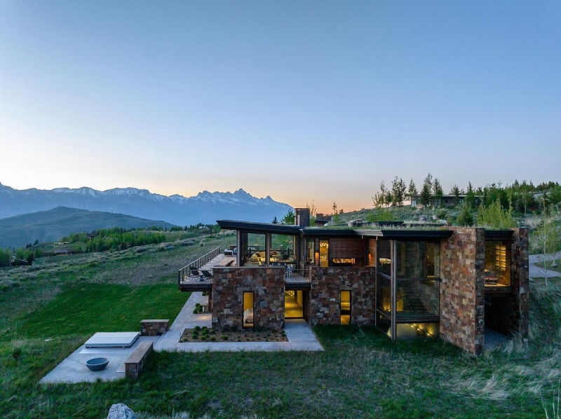 This Grass-Roofed Home With Stone Walls Feels Like It Grew From the Mountain