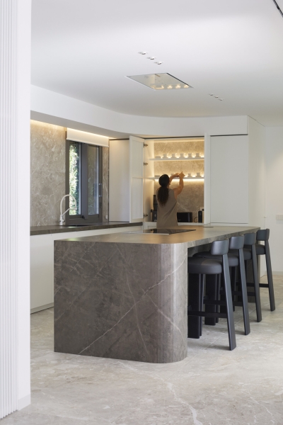 Tucked Behind This Minimalist Home Is a Backyard Oasis
