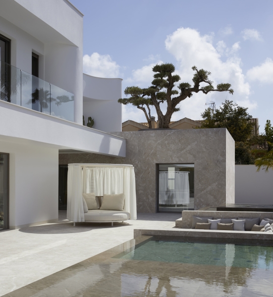 Tucked Behind This Minimalist Home Is a Backyard Oasis
