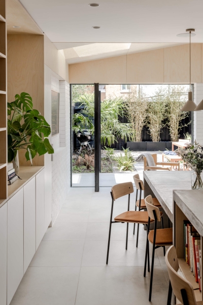 A black wood extension turned this house in London into a light filled garden home