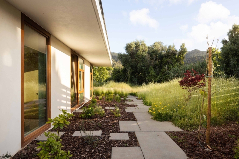 Blending Into Nature: A Half-Buried House With A Green Roof