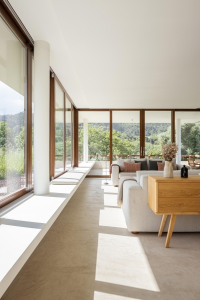 Blending Into Nature: A Half-Buried House With A Green Roof