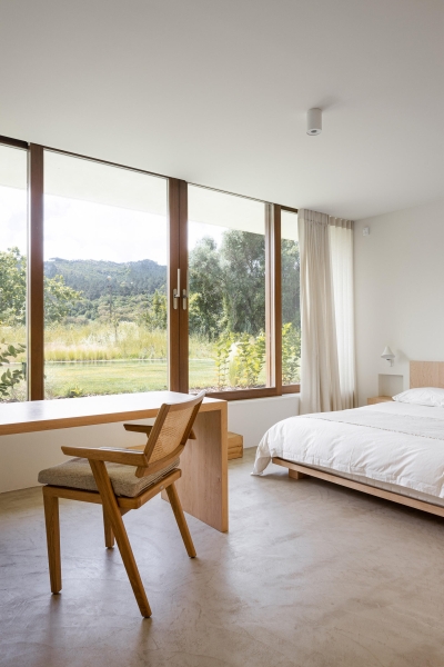 Blending Into Nature: A Half-Buried House With A Green Roof