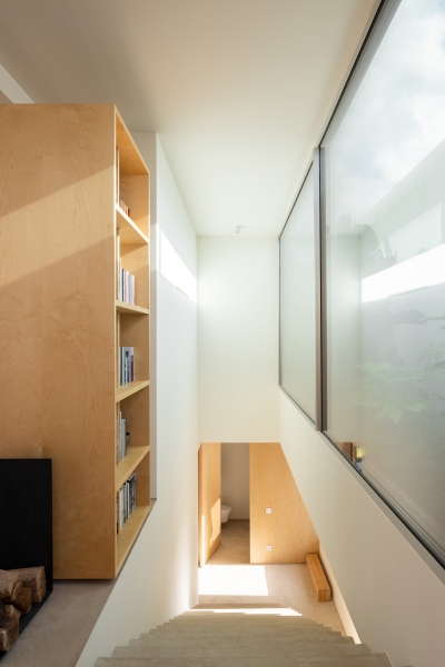 Blending Into Nature: A Half-Buried House With A Green Roof