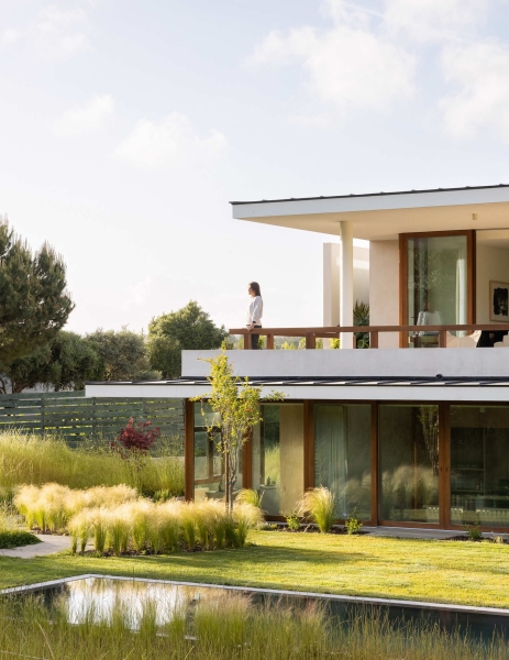Blending Into Nature: A Half-Buried House With A Green Roof