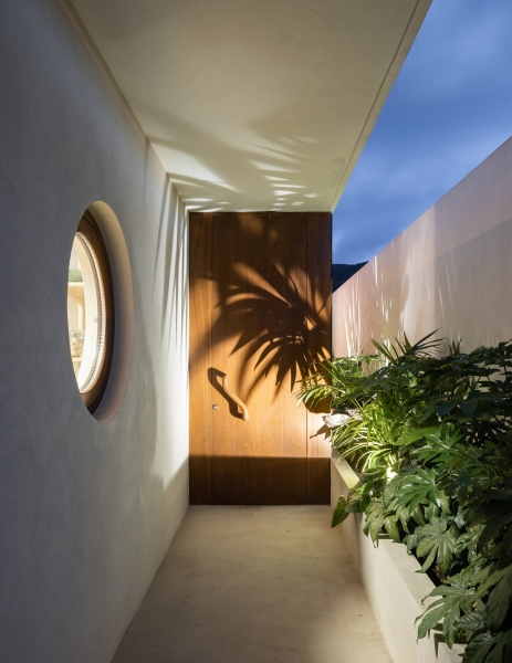 Blending Into Nature: A Half-Buried House With A Green Roof