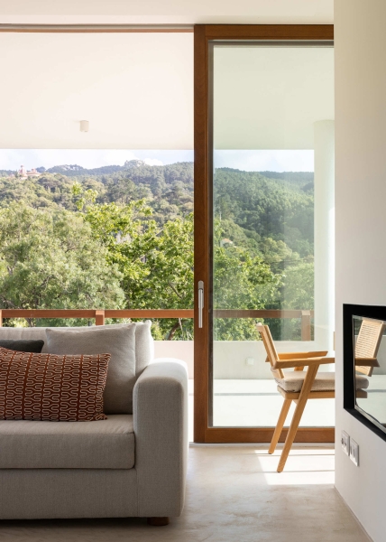 Blending Into Nature: A Half-Buried House With A Green Roof
