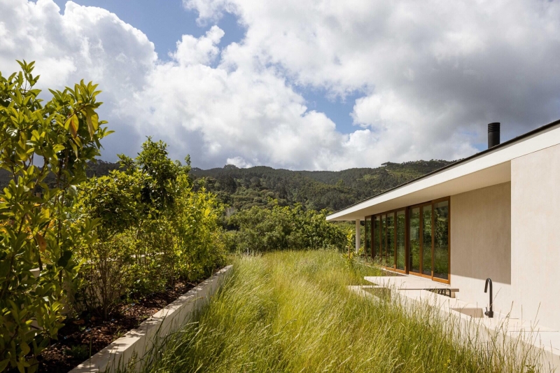 Blending Into Nature: A Half-Buried House With A Green Roof