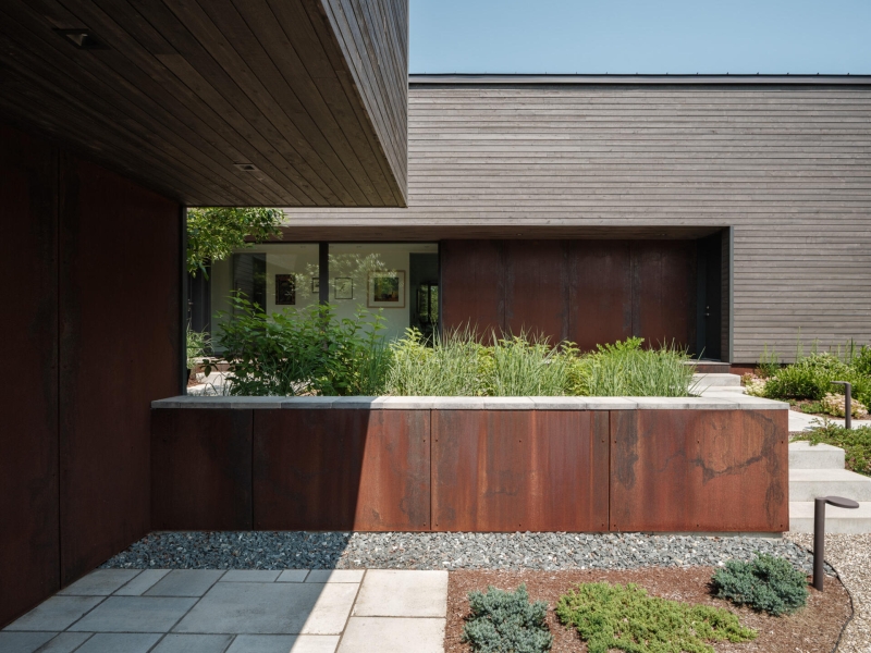 How Rusted Steel Adds Warmth To This Modern Home