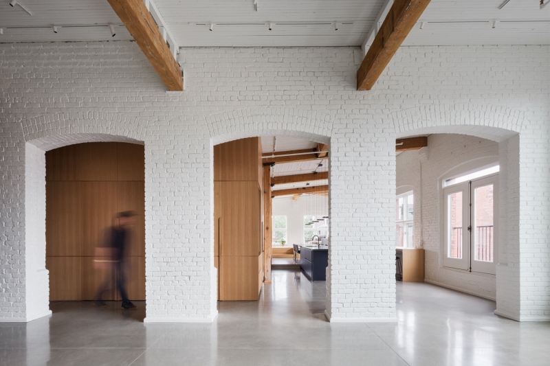 Modern Living Meets Montreal’s History in a Striking Loft Transformation
