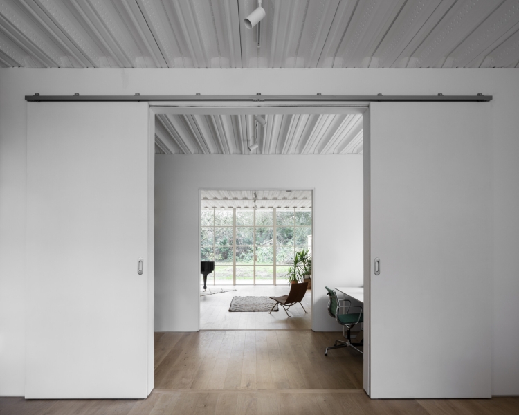 This Home Reimagines Tudor Style With a Modern Twist