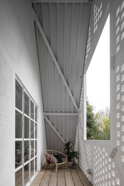 This Home Reimagines Tudor Style With a Modern Twist