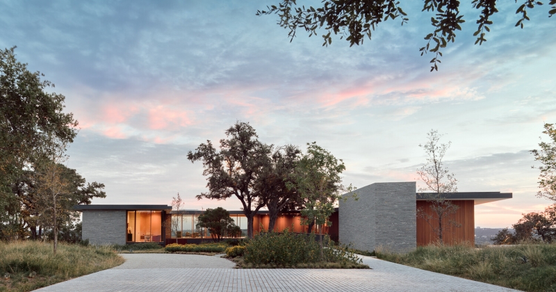 A bridge entry sets up the big reveal inside this home