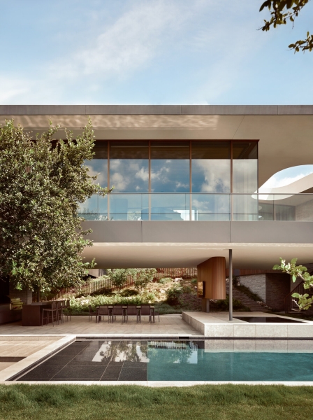 A bridge entry sets up the big reveal inside this home