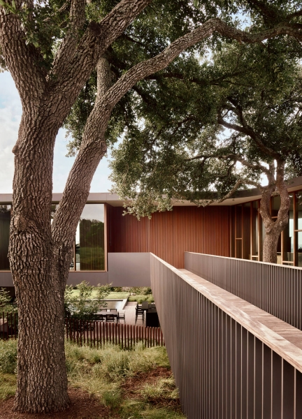 A bridge entry sets up the big reveal inside this home