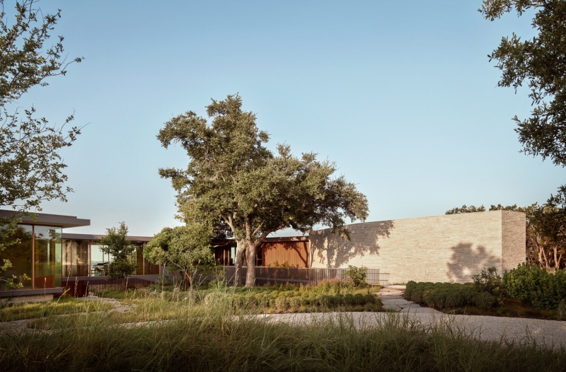 A bridge entry sets up the big reveal inside this home