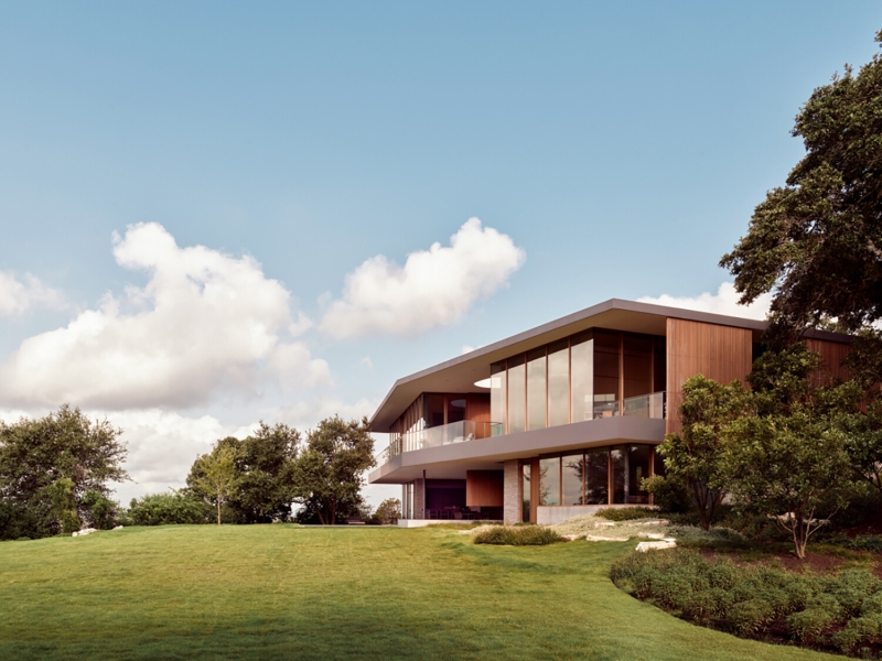 A bridge entry sets up the big reveal inside this home