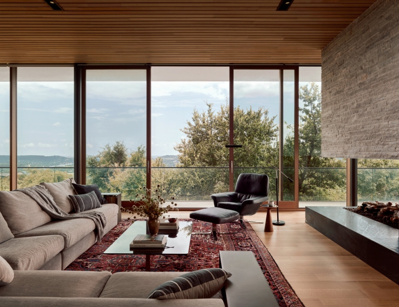 A bridge entry sets up the big reveal inside this home