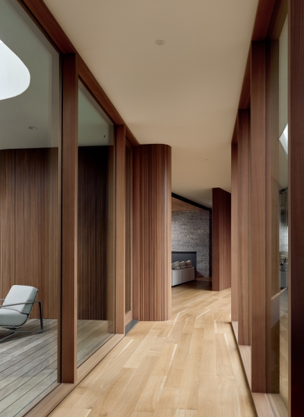 A bridge entry sets up the big reveal inside this home