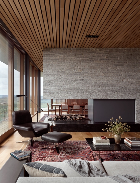A bridge entry sets up the big reveal inside this home