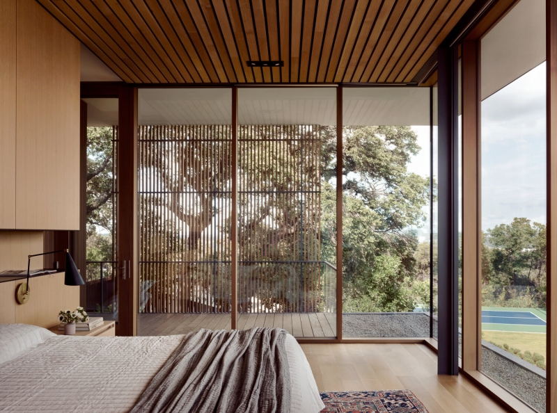A bridge entry sets up the big reveal inside this home