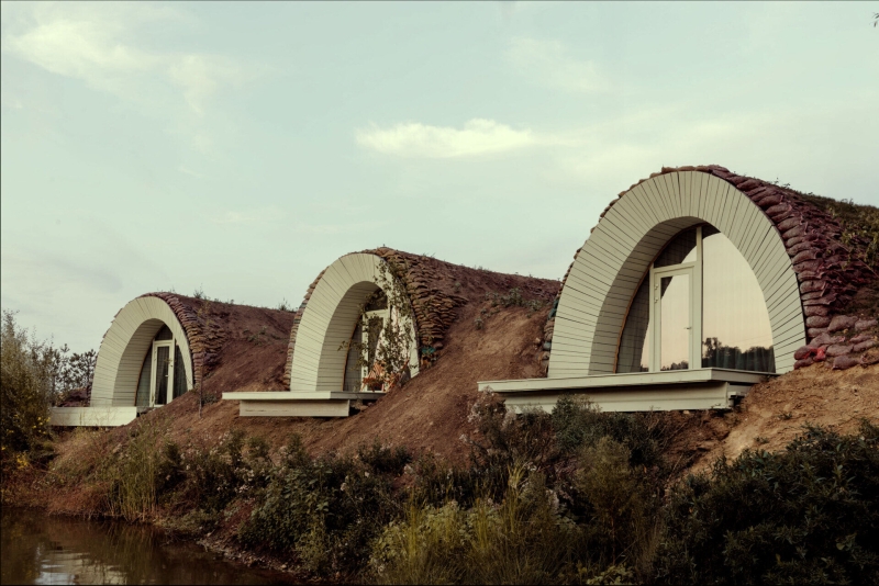 Hobbit houses by the water that look straight out of a story