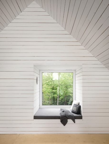Inside the A-frame cabin where floor-to-ceiling glass changes everything