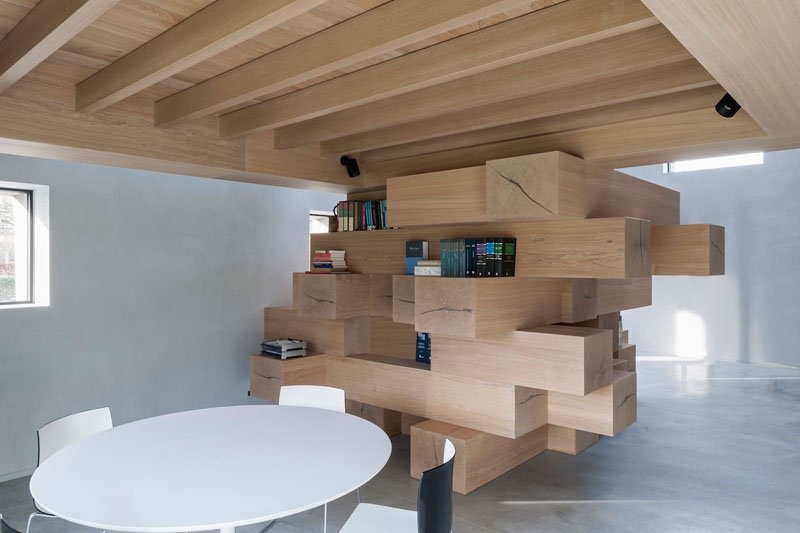 Stacked Wood Beams Turn This Barn Into a Functional Office