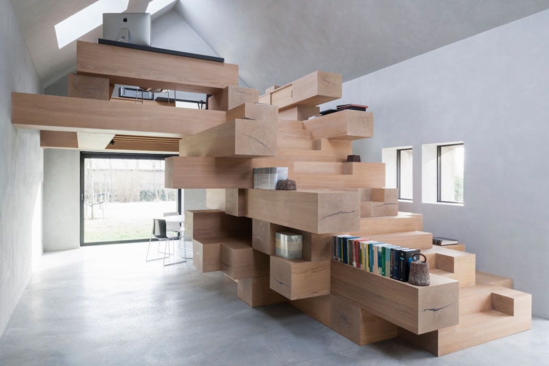 Stacked Wood Beams Turn This Barn Into a Functional Office