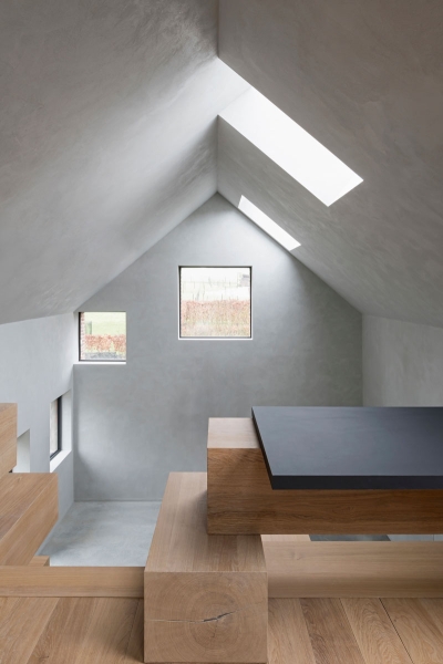 Stacked Wood Beams Turn This Barn Into a Functional Office