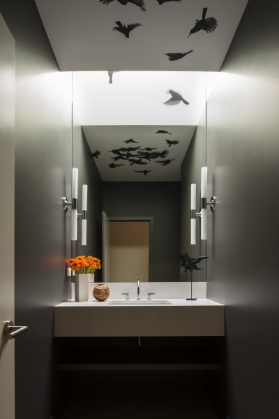 This modern home glows from within as night falls