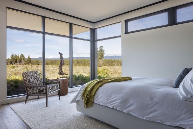 This modern home glows from within as night falls