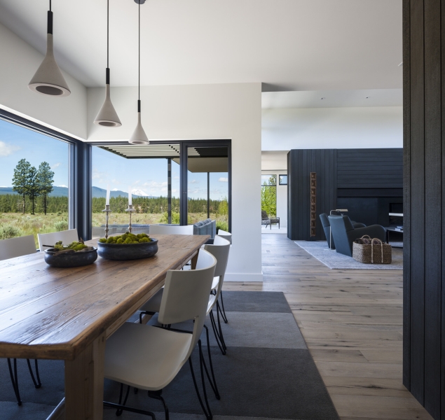 This modern home glows from within as night falls