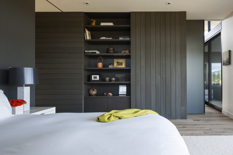 This modern home glows from within as night falls