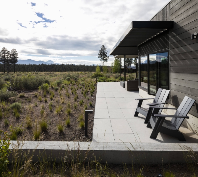 This modern home glows from within as night falls