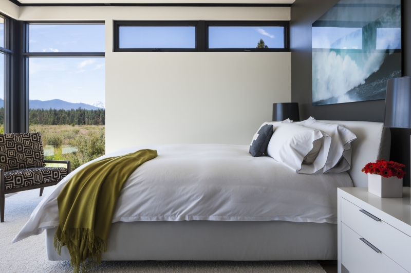 This modern home glows from within as night falls