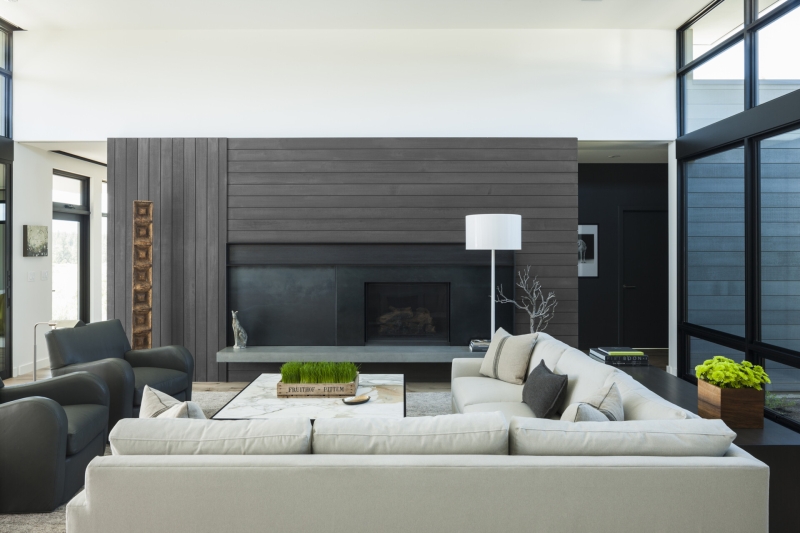 This modern home glows from within as night falls