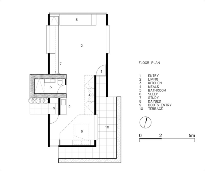 A slow living cabin where fold-out walls transform the space from studio to home
