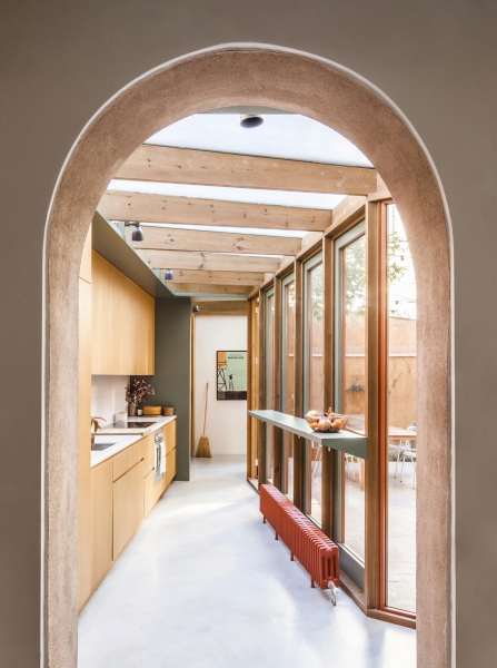 A sunlit kitchen addition that blurs indoors and outdoors