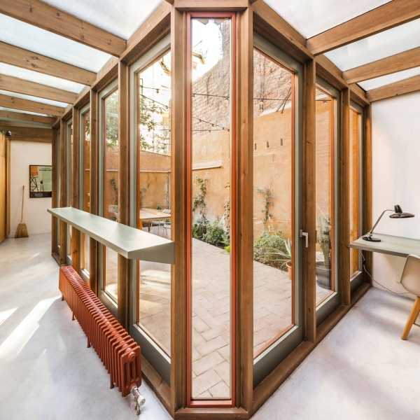 A sunlit kitchen addition that blurs indoors and outdoors