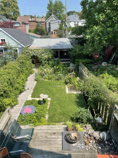 Dragon-Inspired Wood Shingles Cover This Laneway Garage