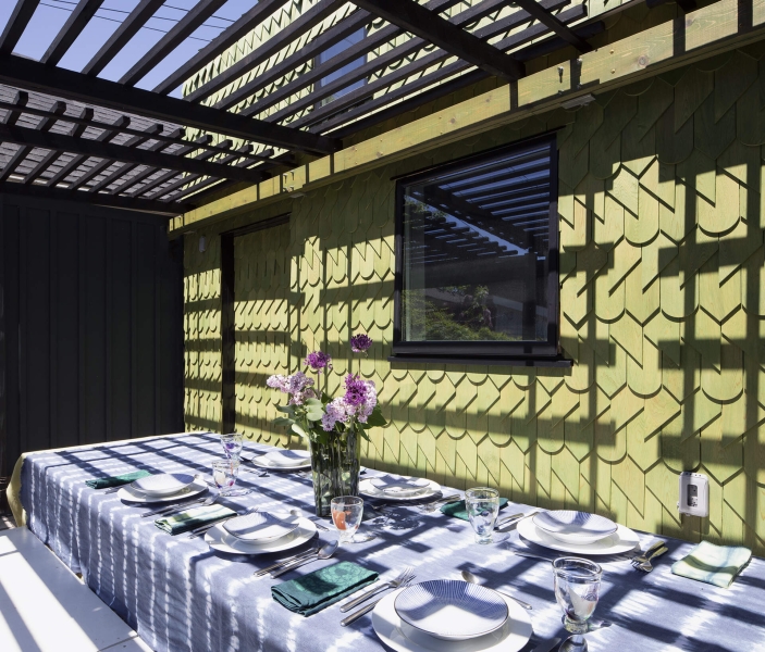 Dragon-Inspired Wood Shingles Cover This Laneway Garage